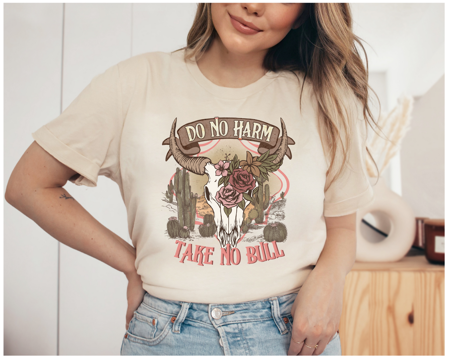 Southwest style tshirt in soft cream color "Do no harm, take no bull"