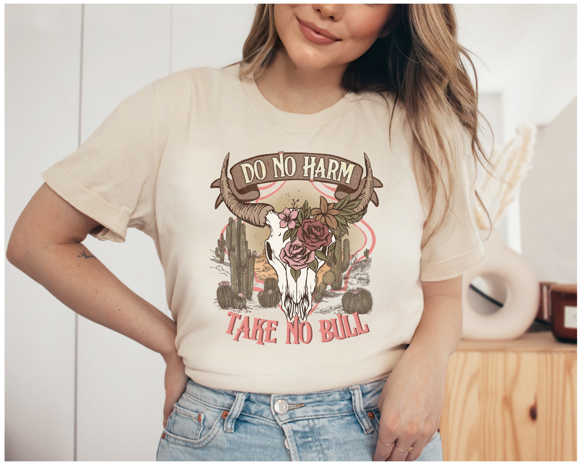 Southwest style tshirt in soft cream color "Do no harm, take no bull"